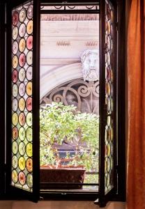 Vonkajšia záhrada v ubytovaní Novecento Boutique Hotel
