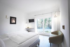 Postel nebo postele na pokoji v ubytování Landhaus am See
