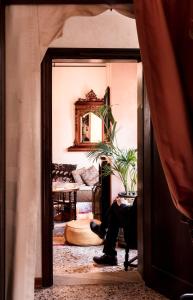 Posedenie v ubytovaní Novecento Boutique Hotel