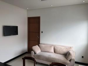Televizorius ir (arba) pramogų centras apgyvendinimo įstaigoje Apartamento Barra Salvador