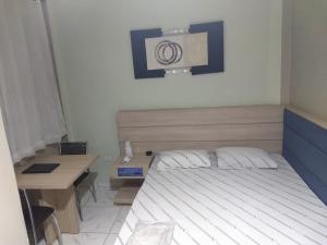 Letto o letti in una camera di Hotel Flex In
