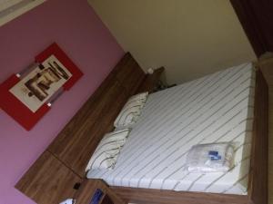 Letto o letti in una camera di Hotel Flex In