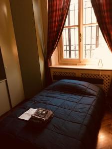 Ένα ή περισσότερα κρεβάτια σε δωμάτιο στο Civico 54 Sassuolo