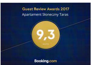 Certyfikat, podpis lub inny dokument wystawiony w obiekcie Baltic Apartments - Apartament Słoneczny Taras