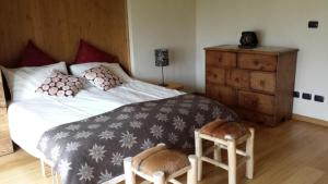 A bed or beds in a room at Chalet Teo e Marianna