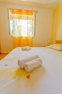 Postel nebo postele na pokoji v ubytování Rooms Karla