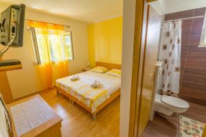 Postel nebo postele na pokoji v ubytování Rooms Karla