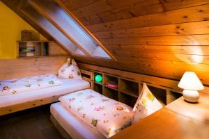 Cama o camas de una habitación en Ferienhof Karin und Florian Gressenbauer