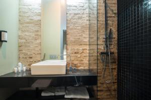 Koupelna v ubytování Cosy Rooms Tapinería