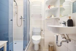 Kúpeľňa v ubytovaní Marszałkowska Apartament