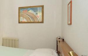 Postel nebo postele na pokoji v ubytování Hotel Miramonti