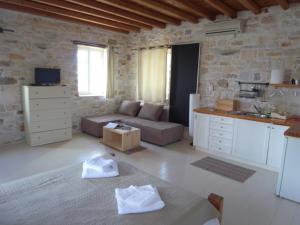 Kuchyň nebo kuchyňský kout v ubytování Villa Naousa