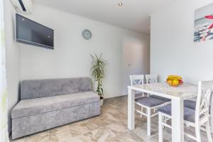 Posezení v ubytování Apartment Adriano