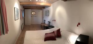 Postel nebo postele na pokoji v ubytování Strågården Nyord