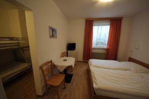 Postelja oz. postelje v sobi nastanitve Hotel Kleinmünchen