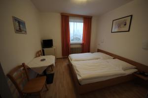 Postelja oz. postelje v sobi nastanitve Hotel Kleinmünchen
