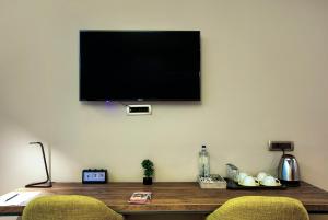 TV a/nebo společenská místnost v ubytování Boulevard Prishtina