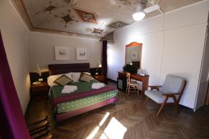 Voodi või voodid majutusasutuse Hotel Villa Bonera toas