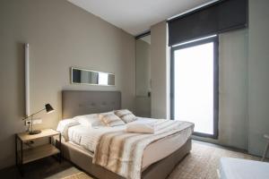 Postel nebo postele na pokoji v ubytování Cosy Rooms Bolsería