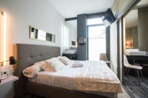 Postel nebo postele na pokoji v ubytování Cosy Rooms Bolsería