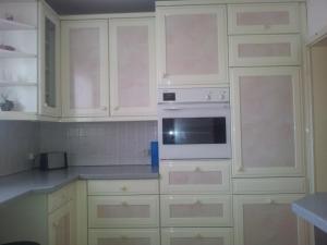 Dapur atau dapur kecil di Cosy Apartment in the City