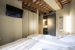 Postel nebo postele na pokoji v ubytování Cosy Rooms Bolsería