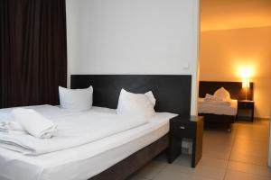 Cama o camas de una habitación en Mosel Hotel