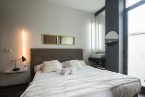 Postel nebo postele na pokoji v ubytování Cosy Rooms Bolsería