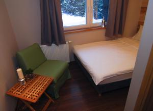 Łóżko lub łóżka w pokoju w obiekcie Karolinka Guest House