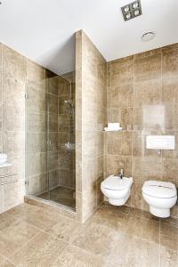 Phòng tắm tại Penthouse direkt am Meer