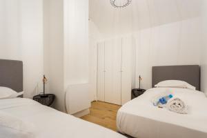 Llit o llits en una habitació de CMG Rivoli/ Notre-Dame II