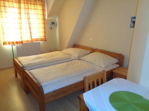 Postel nebo postele na pokoji v ubytování Pension Himmelreich