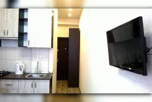 Кухня або міні-кухня у Apartment on Sanatornaya