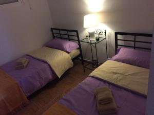 A bed or beds in a room at Apartament La Bonita Még 22 kép