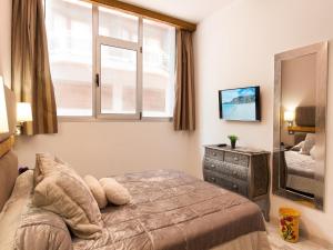 A bed or beds in a room at La Barca M&B II studio close to Las Canteras