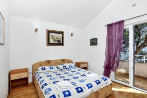 Posteľ alebo postele v izbe v ubytovaní Villa Vranic Apartments