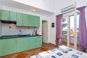 Kuchyňa alebo kuchynka v ubytovaní Villa Vranic Apartments