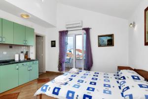 Posteľ alebo postele v izbe v ubytovaní Villa Vranic Apartments
