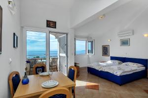 Posteľ alebo postele v izbe v ubytovaní Villa Vranic Apartments