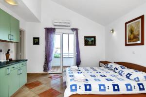 Posteľ alebo postele v izbe v ubytovaní Villa Vranic Apartments