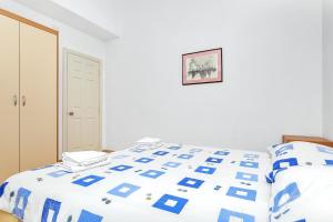 Posteľ alebo postele v izbe v ubytovaní Villa Vranic Apartments