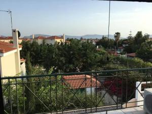 a view of a city from a balcony at Villa Costa Hydra in Plépi