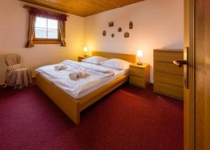 Posteľ alebo postele v izbe v ubytovaní Apartmán Vŕšky Terchová