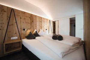 En eller flere senger på et rom på Appartements Bergheim St Andrä bei Brixen