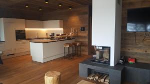 Kuchyň nebo kuchyňský kout v ubytování Wildererhütte Chalet Helmut