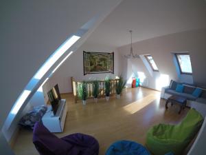 an overhead view of a living room with a staircase at Wild Soca House Apartment No.5 in Bovec
