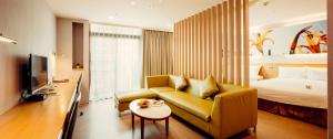 Televisyen dan/atau pusat hiburan di Mellow Fields Hotel