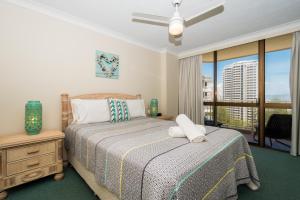 Postel nebo postele na pokoji v ubytování Breakers North Absolute Beachfront Apartments - Official + 37 fotografií