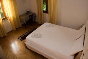 A bed or beds in a room at Casa Martello