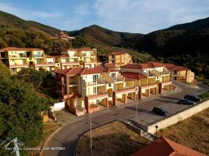an overhead view of a town with houses and a street at Bicchi Belvedere Scarlino in Scarlino